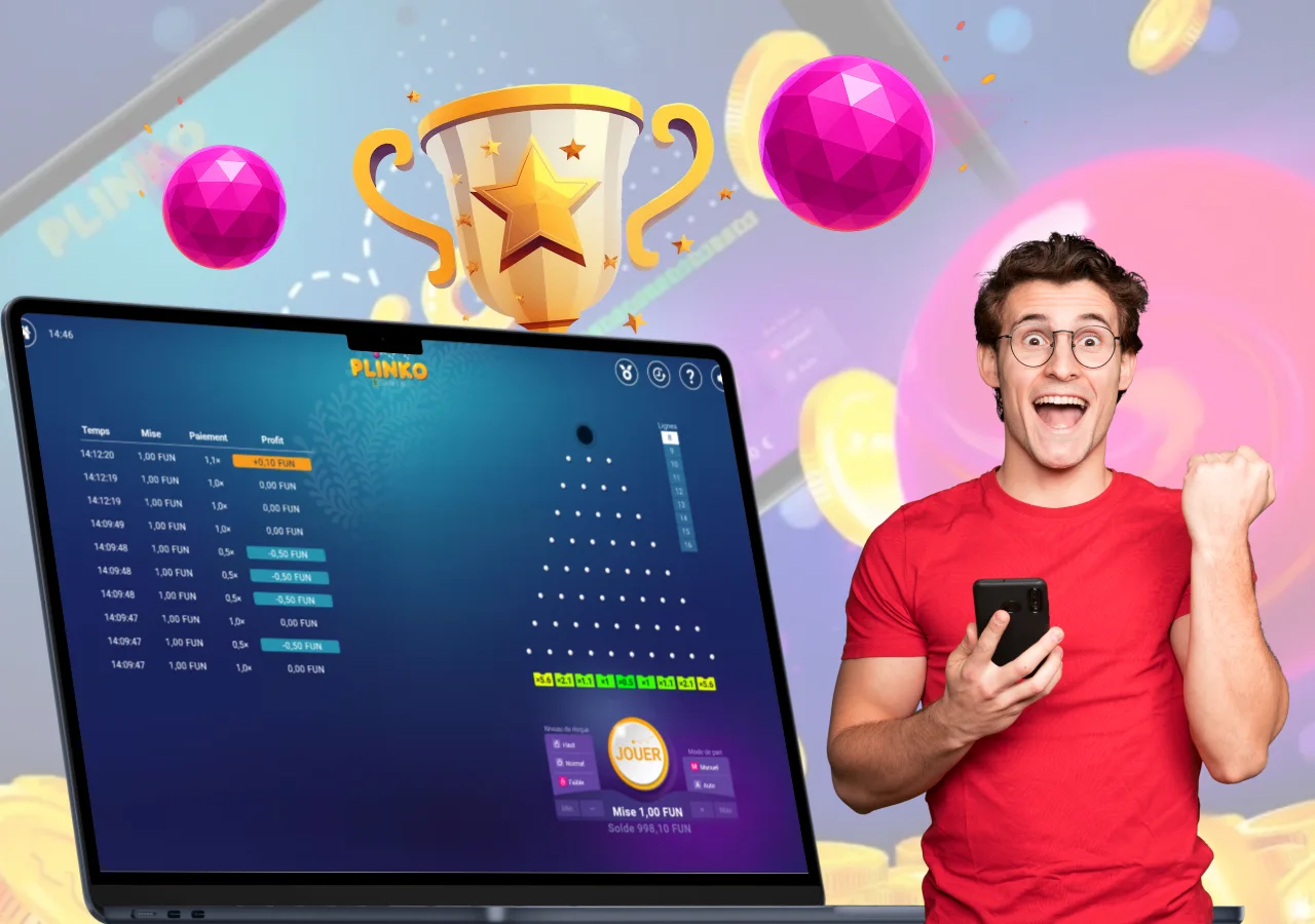 Homme enthousiaste tenant un téléphone devant l’écran Plinko avec trophée et billes en mouvement